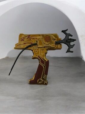 Vintage beyblade Gold and Maroon Toy Blaster with Black Accents